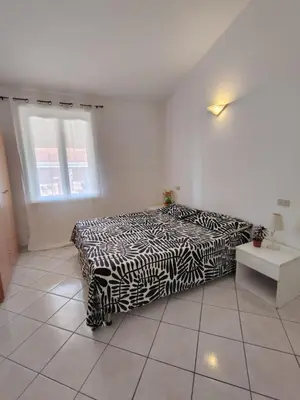 Letto o letti in una camera di Il Nido 2 di San Pietro