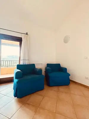 Area soggiorno di Apartment in Olbia Murta Maria