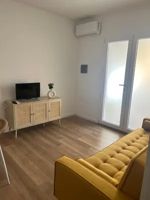 TV o dispositivi per l'intrattenimento presso Felce Orosei Apartment