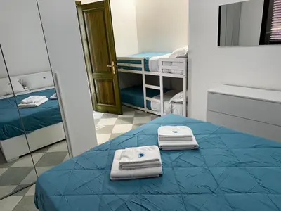 Letto o letti in una camera di Su Coru Budoni