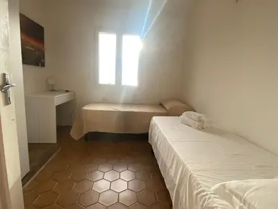 Letto o letti in una camera di La casa dei pescatori