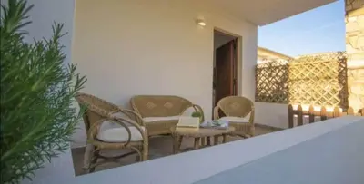 Area soggiorno di Emil's Vacation Home La Caletta