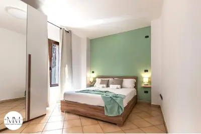 Letto o letti in una camera di MMHS-Olbia Centro