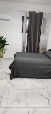 Letto o letti in una camera di Le Dimore del Sole Olbia Costa Smeralda