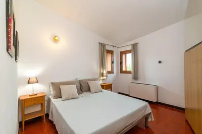 Letto o letti in una camera di Terrazza House Bados beach