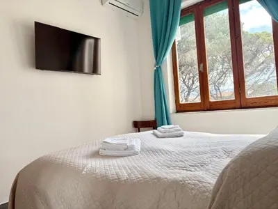 Letto o letti in una camera di all ombra dei pini