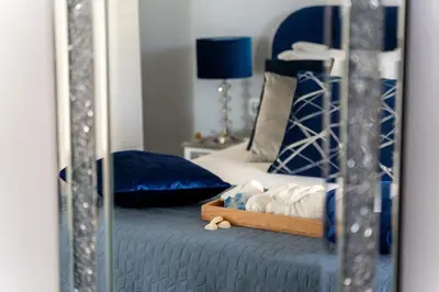 Letto o letti in una camera di Villa Il Sogno A dream with open eyes, seafront