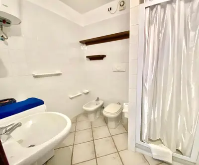 Bagno di Luxury apartment Ginepro sea view with common swimming pool just 50 mt from the beach