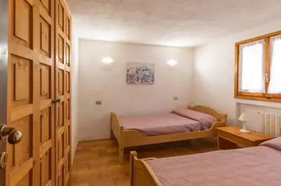 Letto o letti in una camera di Baia Caddinas Homes by Wonderful Italy