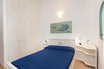 Letto o letti in una camera di Rosa