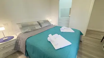 Letto o letti in una camera di Blu Caletta - waterfront apartment with garden