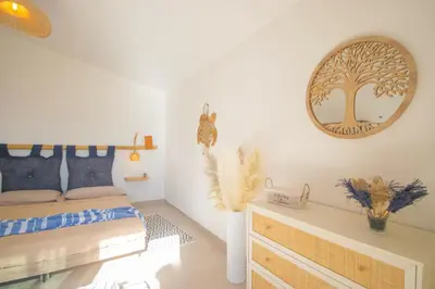 Letto o letti in una camera di Rena & Agua Apartments