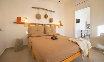 Letto o letti in una camera di Rena & Agua Apartments