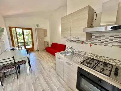 Cucina o angolo cottura di Appartamento a 650 mt dal mare - San Teodoro
