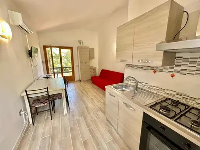 Cucina o angolo cottura di Appartamento a 650 mt dal mare - San Teodoro