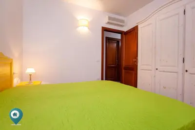 Letto o letti in una camera di Verde Mela