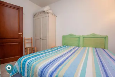 Letto o letti in una camera di Verde Mela