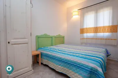 Letto o letti in una camera di Verde Mela