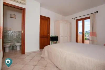 Letto o letti in una camera di Verde Mela