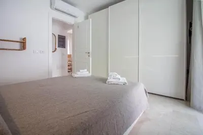 Letto o letti in una camera di GuestHost - Stunning Apartment in Pittulongu with Pool