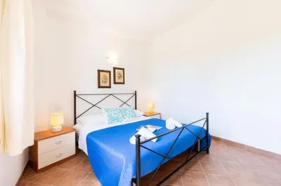 Letto o letti in una camera di Panoramic Terrace Over Tavolara - Relax and Sea View