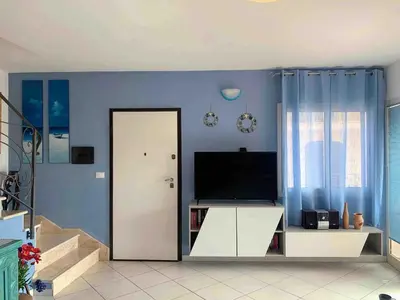 TV o dispositivi per l'intrattenimento presso Modern Seaview Townhouse - Workcation friendly