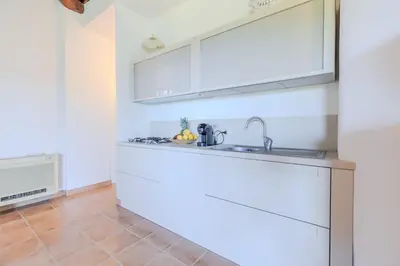 Cucina o angolo cottura di Villa Capo Coda Cavallo Baia Salinedda
