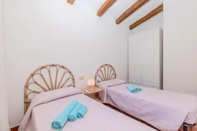 Letto o letti in una camera di Villa Due Mari Coda Cavallo