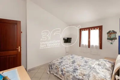 Letto o letti in una camera di Lu Mattoni
