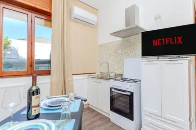 Cucina o angolo cottura di Nordlys Apartment - A due passi dal lungomare -