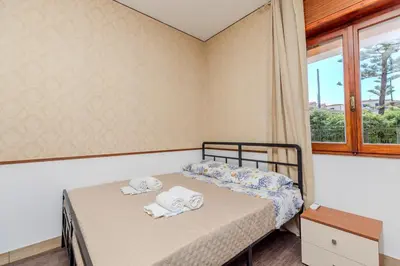 Letto o letti in una camera di Nordlys Apartment - A due passi dal lungomare -