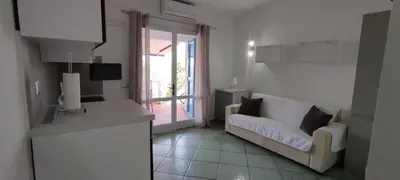 Letto o letti in una camera di SUNRISE SARDINIA San Teodoro