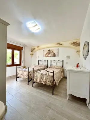 Letto o letti in una camera di Villa S'Isula - Relax in the Countryside