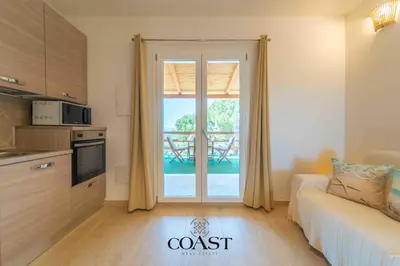 Cucina o angolo cottura di Olbia Country Retreat- AC, WiFi, Doccia esterna