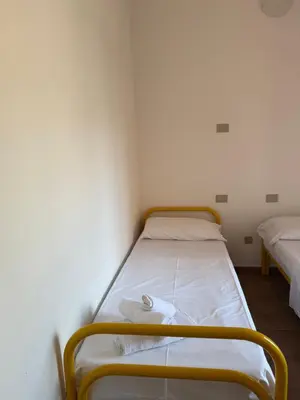 Letto o letti in una camera di La Domus di Jacqueline