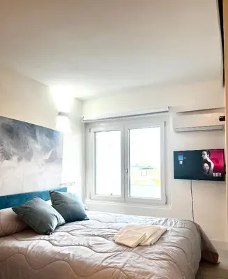 Letto o letti in una camera di Urban House