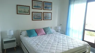 Letto o letti in una camera di Casa Maggy