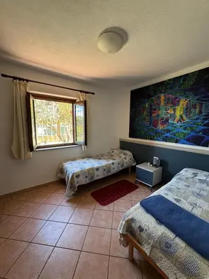Letto o letti in una camera di L'Oasi Del Mare