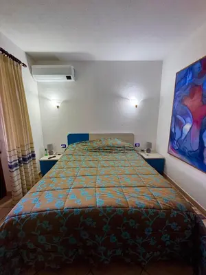 Letto o letti in una camera di L'Oasi Del Mare