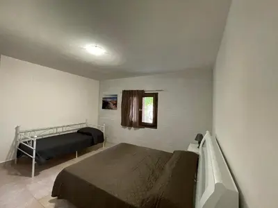 Letto o letti in una camera di domo prama 2