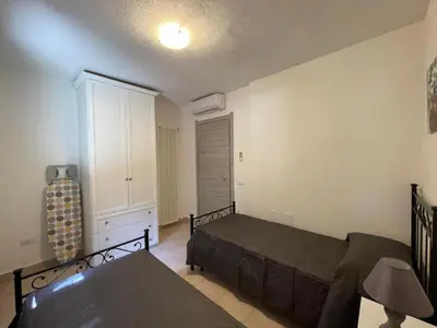 Letto o letti in una camera di domo prama 2