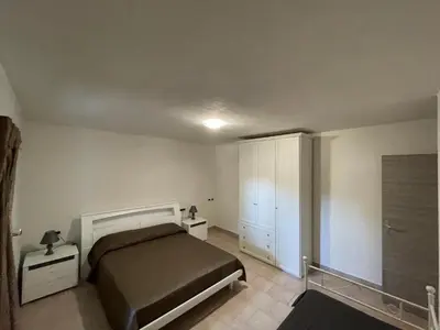 Letto o letti in una camera di domo prama 2