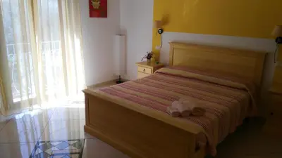Letto o letti in una camera di B&b Sa Zodia Guest House