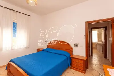 Letto o letti in una camera di Tirreno Bilo 3