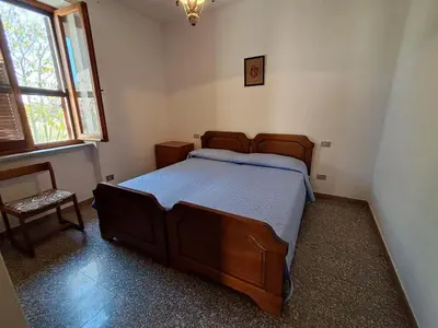 Letto o letti in una camera di fmp-ps01 villa 300 metri mare 4 letto