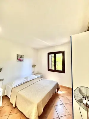 Letto o letti in una camera di Villino del Porto