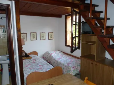 Letto o letti in una camera di Monolocale San Teodoro