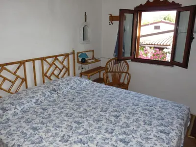 Letto o letti in una camera di Monolocale San Teodoro