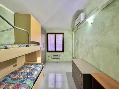 Letto o letti in una camera di Casa vacanza San Teodoro