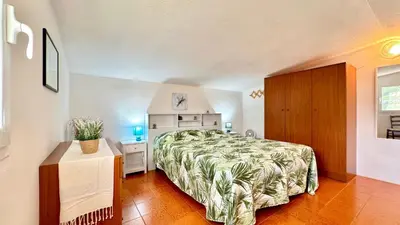 Letto o letti in una camera di Tina's Tiny House - 10 meters from the beach